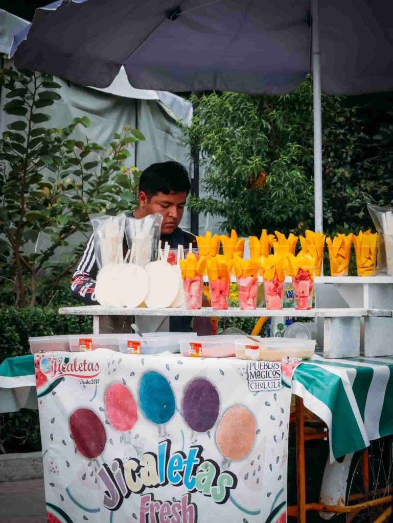 Street vendor at a fruit stand in Cholula